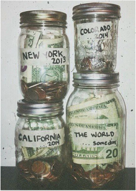 mason jars filled with money to save for travel adventures
